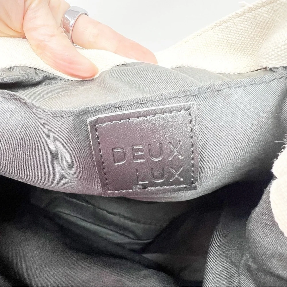 DEUX LUX OFF-WHITE CANVAS VEGAN BLACK LEATHER BACKPACK